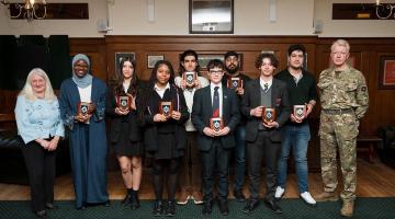 From left to right: Cllr Daryl Brown, Hannah Nakitto, Brenda Manic, Trinity Patterson, Arta Moghaddasi Esfevashi, Simeon Allcock, Gurpreet Singh, Luis Munoz, Mohammad Malekzadeh and Major Rudy Vandaele-Kennedy