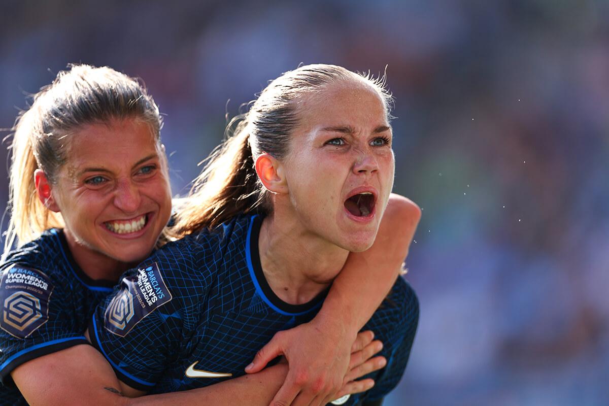 Guro Reiten of Chelsea Women (right) celebrates after scoring a goal in Manchester on 8 October 2023