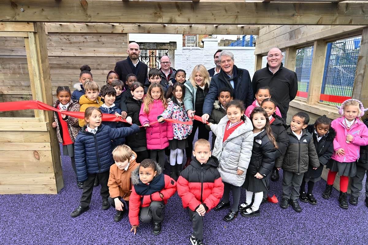 Cllr Ben Coleman, representatives of construction firm Rockwell and children from Langford Primary School at the unveiling