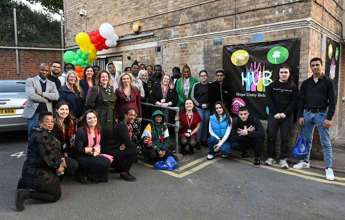 Some of H&F's young care leavers with Cllr Alex Sanderson (centre) outside their new hub, 2023