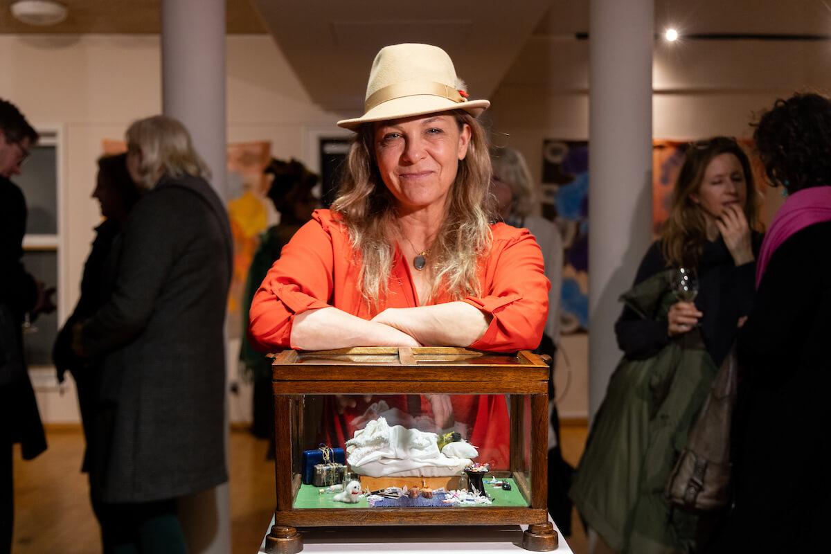 Kindred Studios artist Cordelia Plunket with her replica of Tracey Emin's 'My Bed'