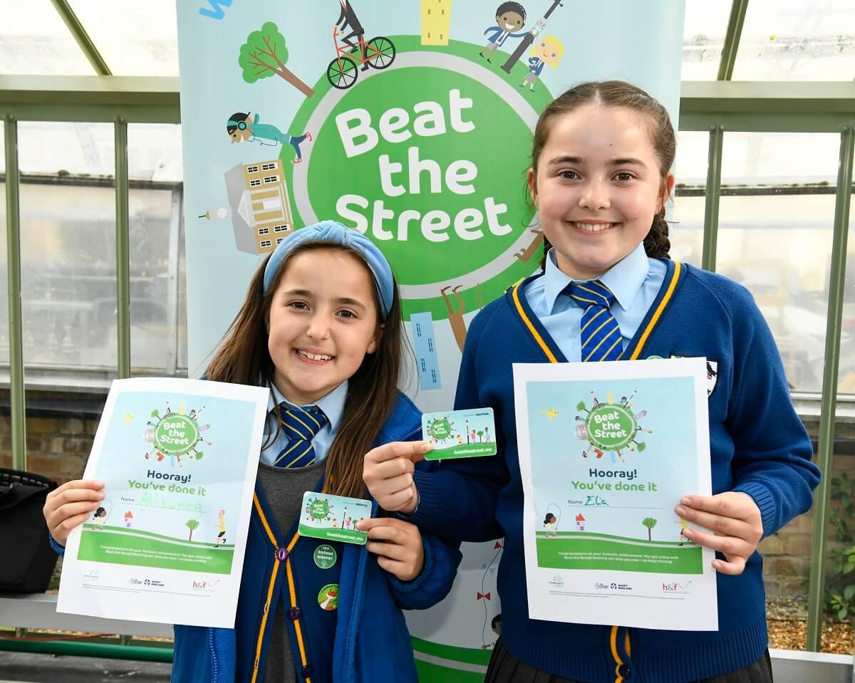 Sisters Alicia (left) and Elia (right), pupils at St Thomas Canterbury primary school in Fulham