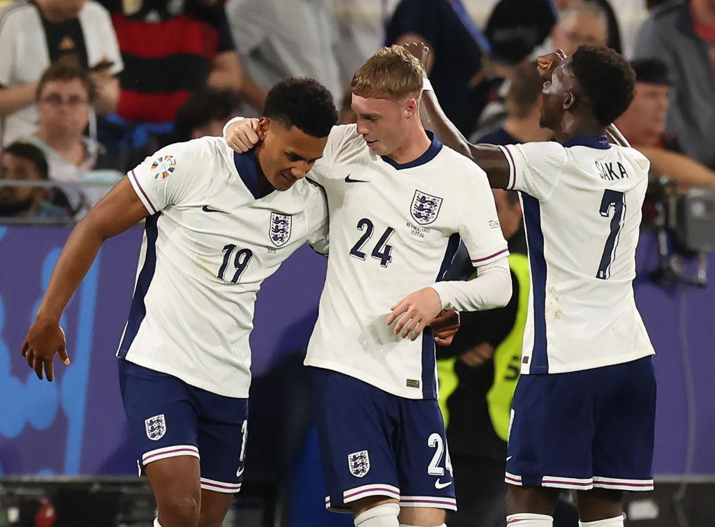 Cole Palmer celebrates with Ollie Watkins during England's victory over the Netherlands