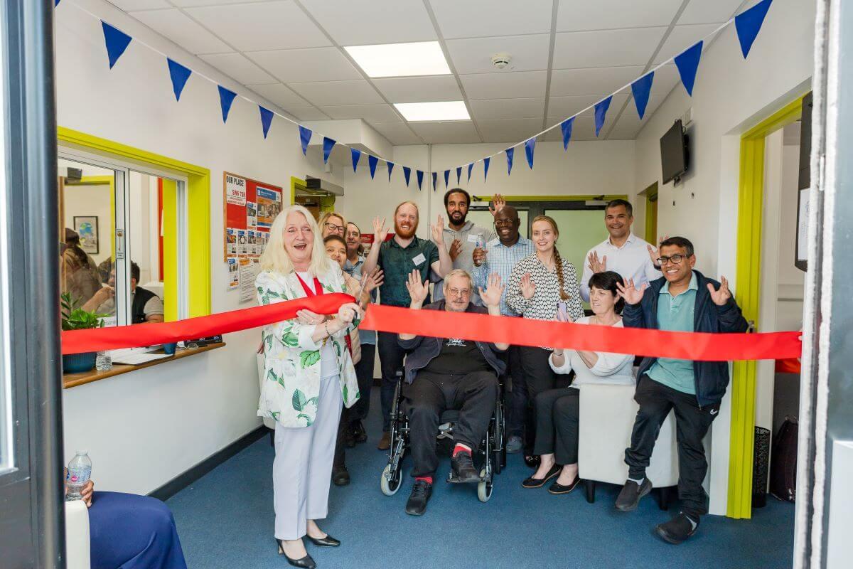 Cllr Brown, Deputy Mayor of H&F, cuts the ribbon at Our Place opening