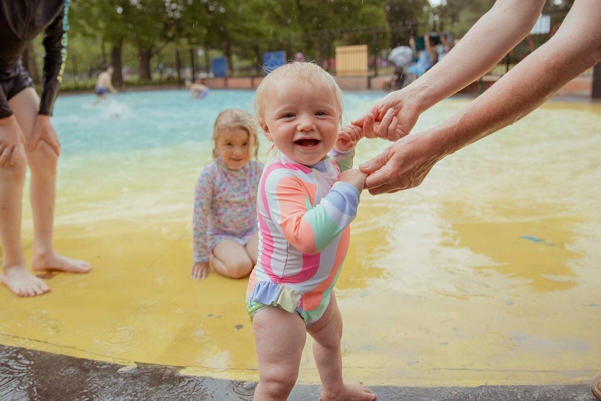 Hammersmith children enjoying the paddling pool in Ravenscourt Park