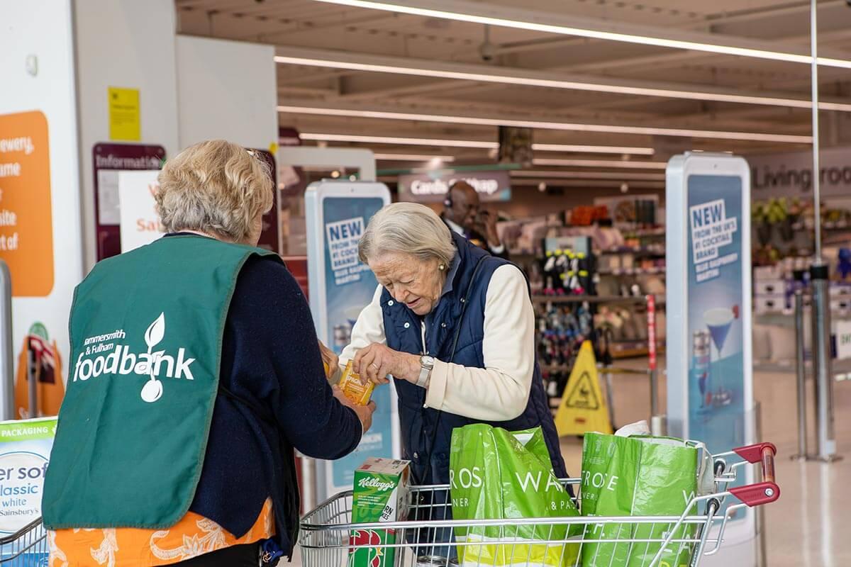 H&F Foodbank volunteer collecting donations at Sainsbury's in Imperial Wharf