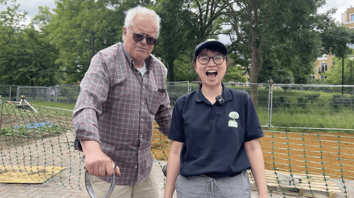 A resident with a volunteer from Hammersmith Garden Community Association