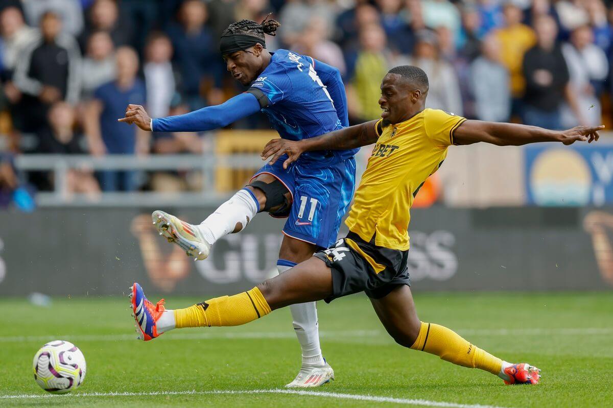 Noni Madueke scores his second goal past Toti Gomes of Wolverhampton Wanderers