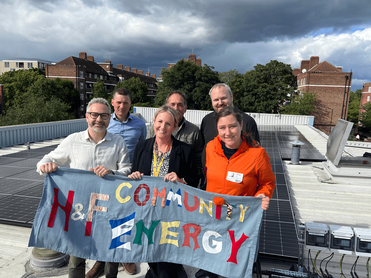 Jack Tizard headteacher, Francesca Smith (front centre), launched the new solar panel scheme together with members from H&F Community Energy and H&F Council