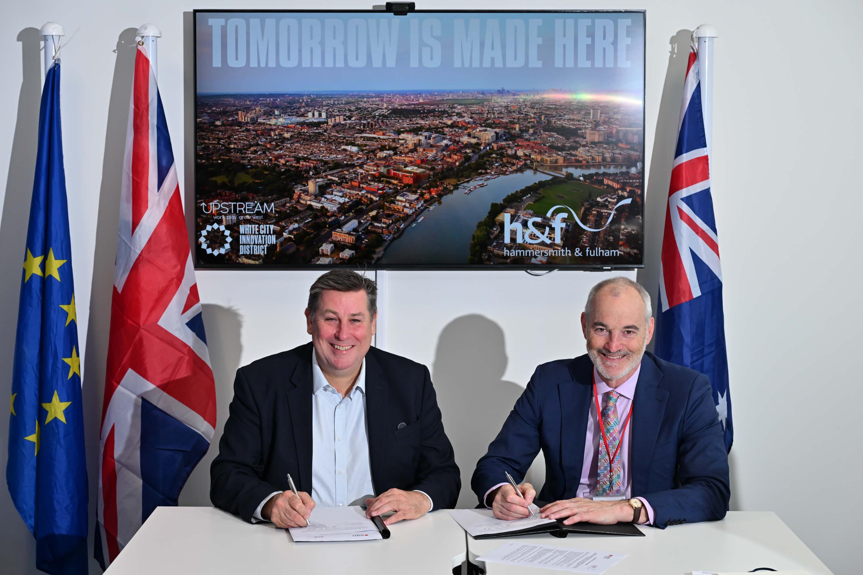 H&F Leader Cllr Stephen Cowan (left) and Alec Cameron, Vice-Chancellor and President at the Royal Melbourne Institute of Technology (right) sign the new partnership agreement at H&F's WEST Youth Zone