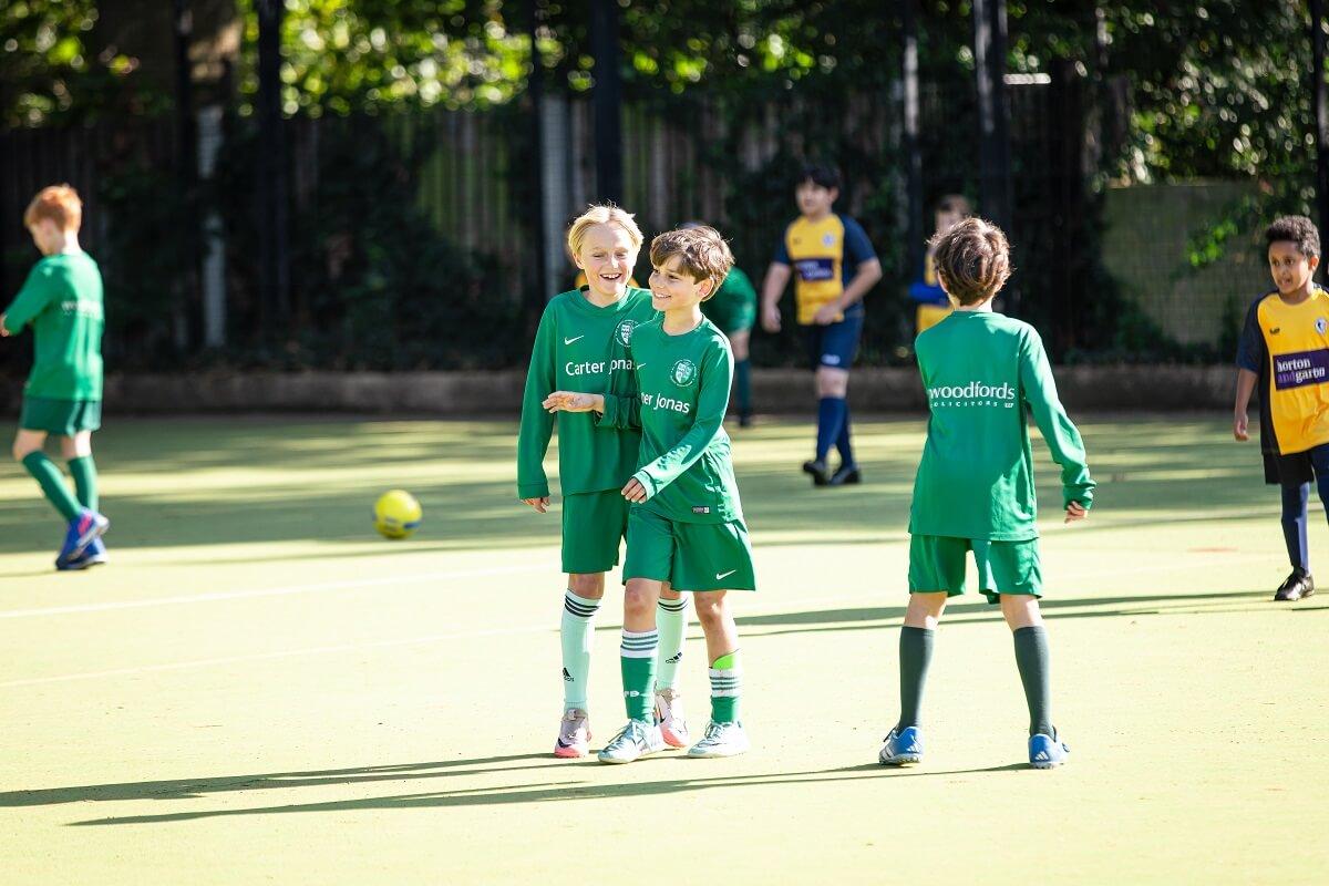 All Saints boys team celebrate scoring against St Pauls.