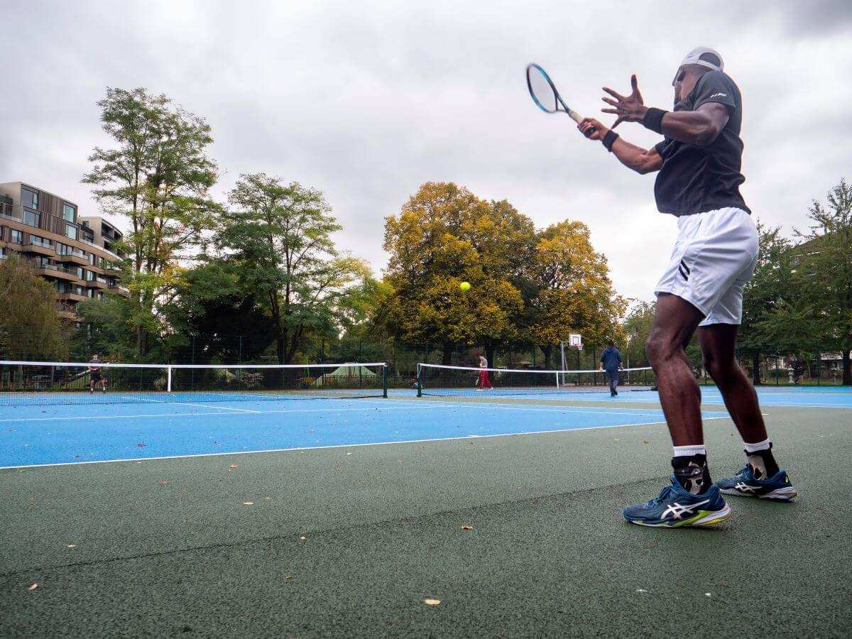 Residents playing tennis at Hammersmith Park's new tennis courts