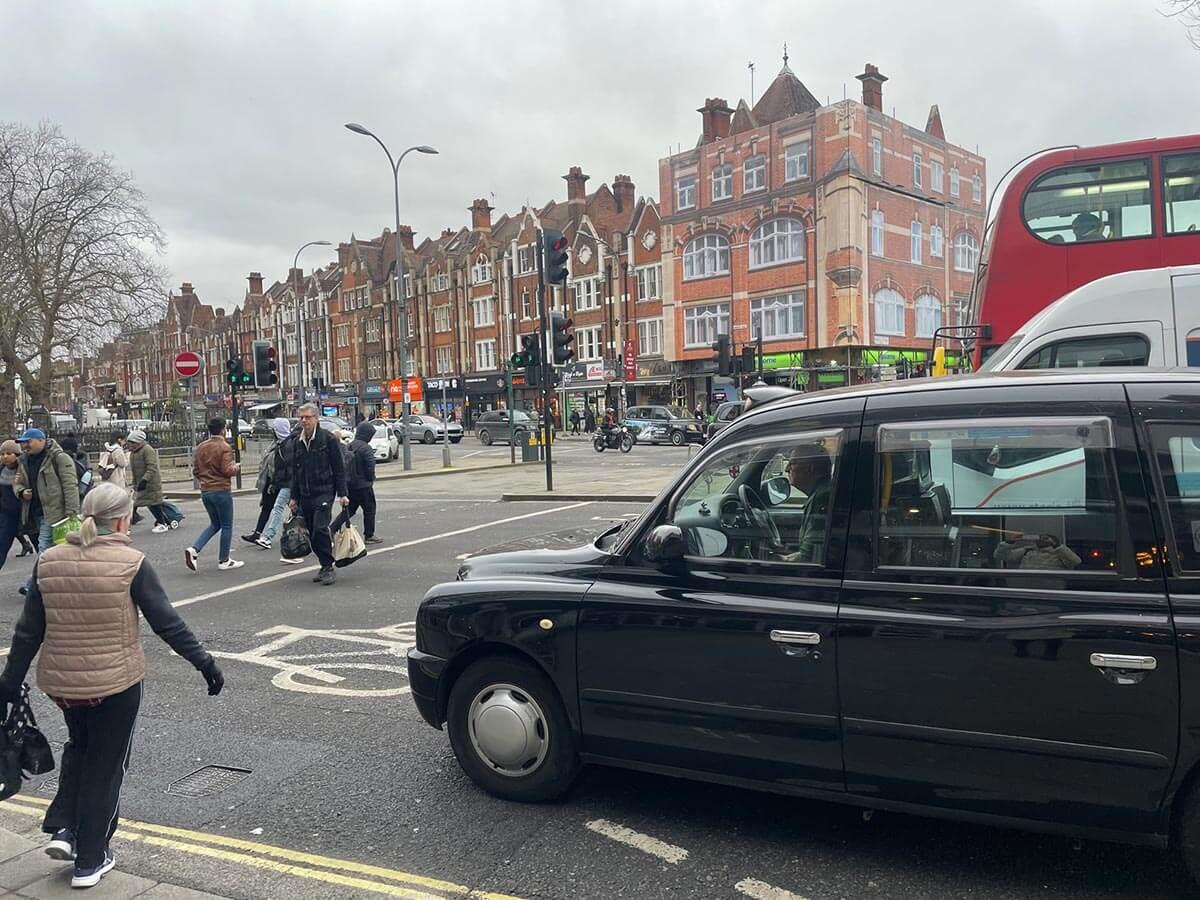 Exit from the Holland Park roundabout towards Shepherds Bush Green