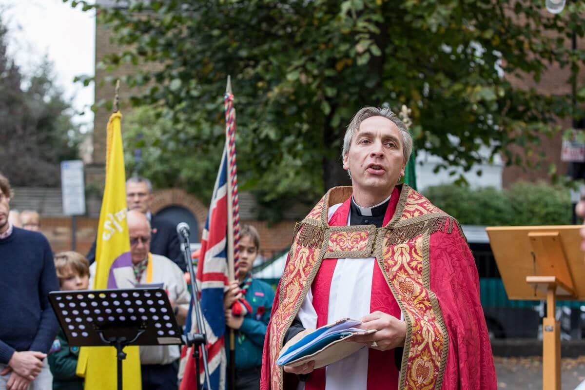 Fr Ross Gunderson leads the service of dedication