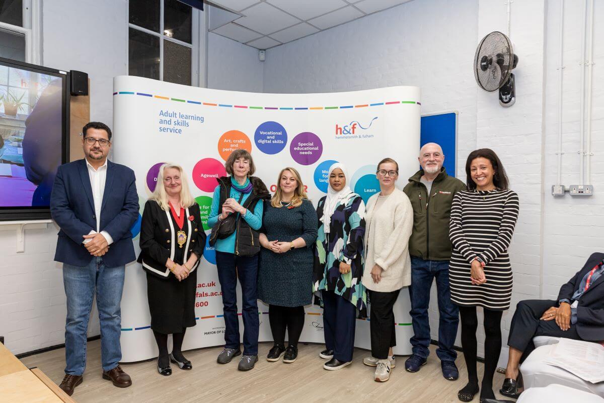 L-R: H&F's Deputy Mayor Daryl Brown (second from the left), Deputy Leader of H&F Cllr Alex Sanderson (middle) with interpreting student Natalia Morozova (third from right) and other learners.