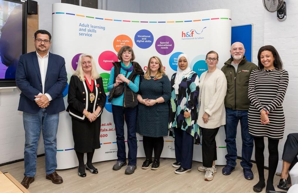 L-R: H&F's Deputy Mayor Daryl Brown (second from the left), Deputy Leader of H&F Cllr Alex Sanderson (middle) with interpreting student Natalia Morozova (third from right) and other learners.