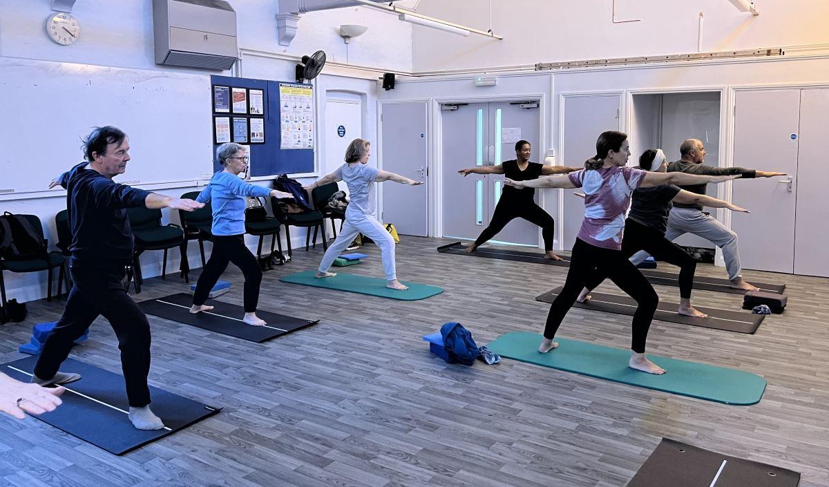 Donna Peart (middle) teaching a Hatha Yoga class