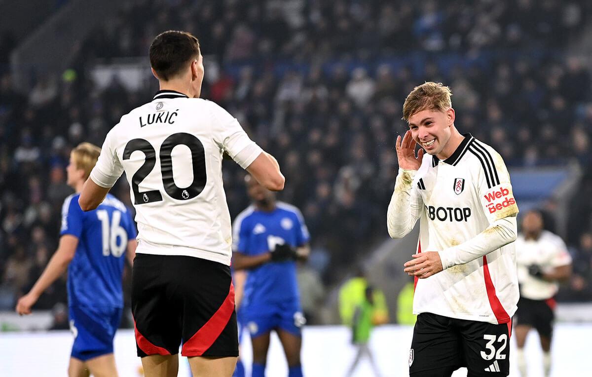 Emile Smith Rowe (right) celebrates with teammate Sasa Lukic after scoring Fulham's first goal