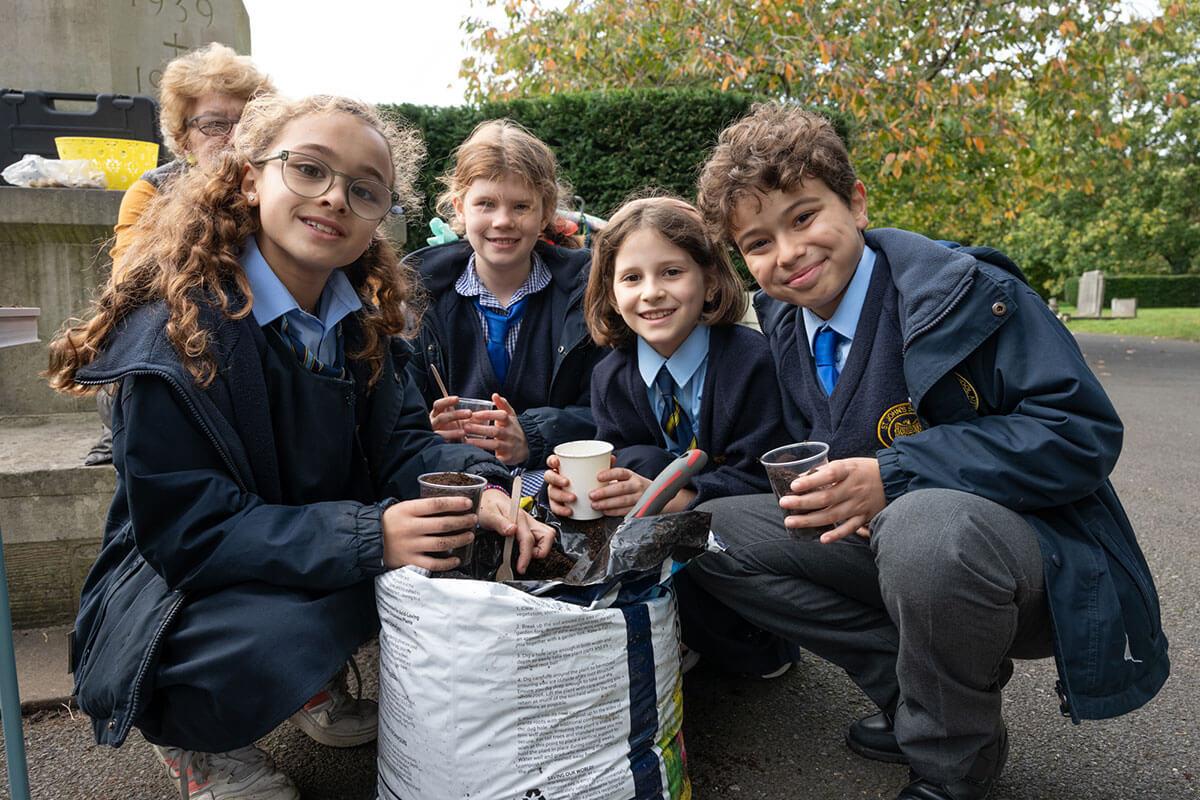 Pupils from local St John’s Walham Green primary school at work in Fulham Cemetery