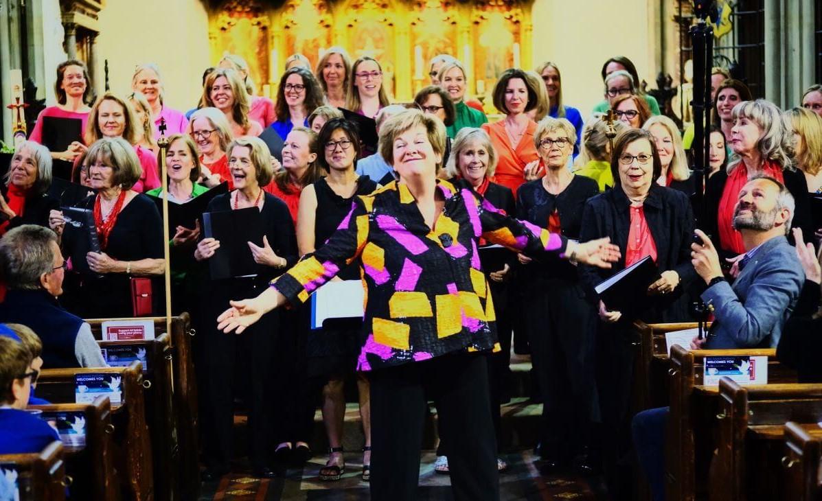 Music by the Bridge curator, Anna Boucher, (middle) with choir at All Saints Fulham