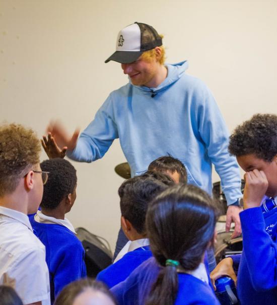 Ed Sheeran meets pupils from Addison Primary School