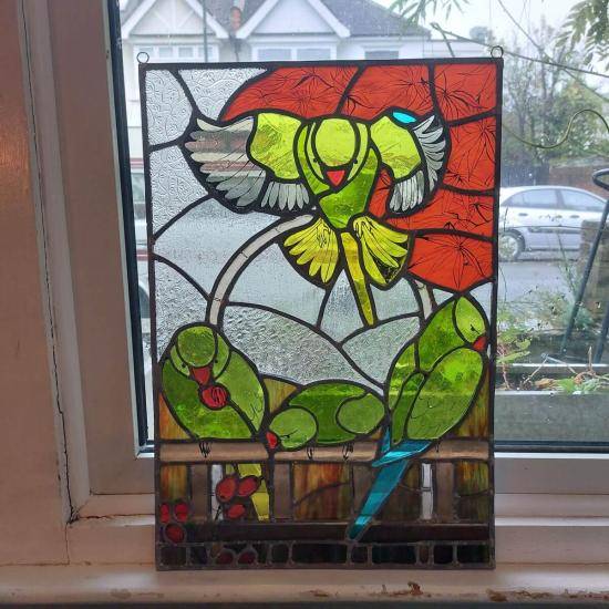 Lucy Floyer's stained glass piece, Parakeets in Ealing