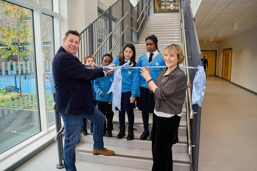 Cllr Stephen Cowan (left) cutting the ribbon