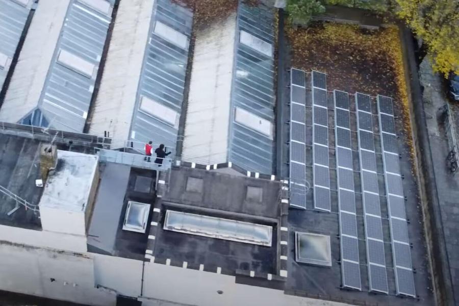 Cllr Rowan Ree, Cabinet Member for Finance and Reform, visits the newly installed solar panels on the Masbro community centre in W14