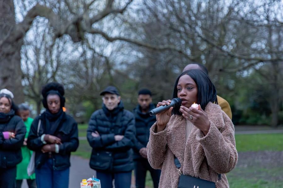 Alex's sister and Met Police officer, Khafi Kareem, speaking at the vigil