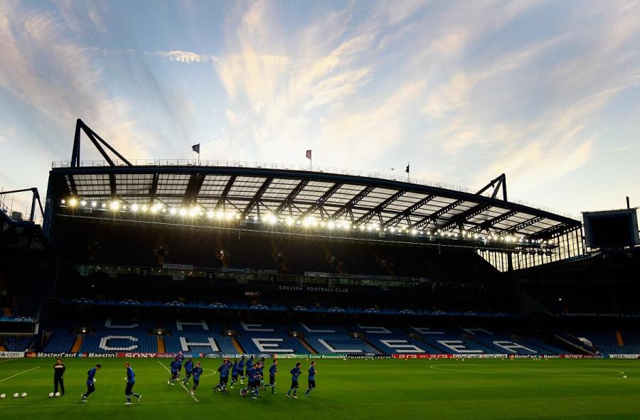 Chelsea players warming up at stamford bridge