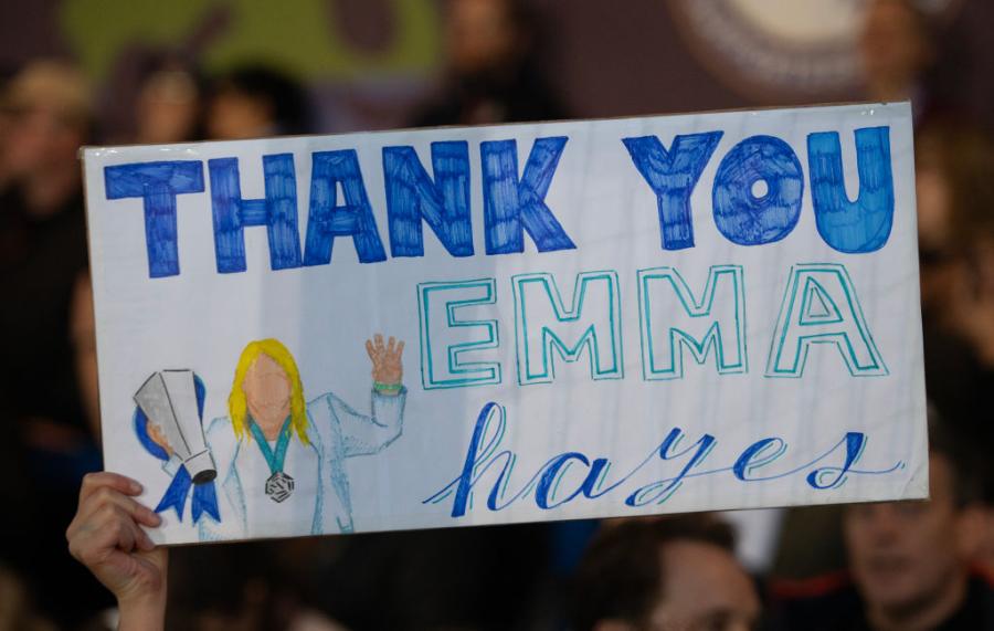 A fan's sign paying tribute to Hayes at Kingsmeadow