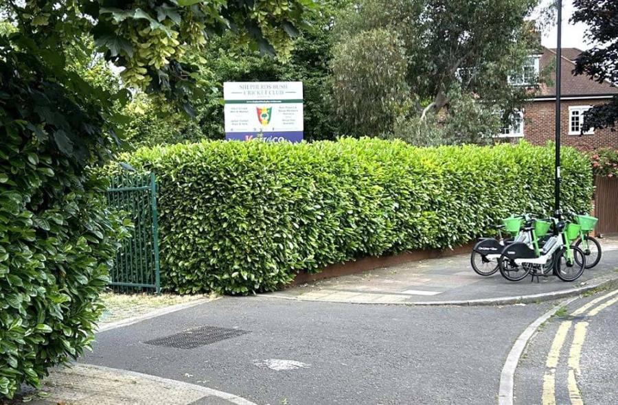 Hire bikes stand outside the Bromyard Avenue ground