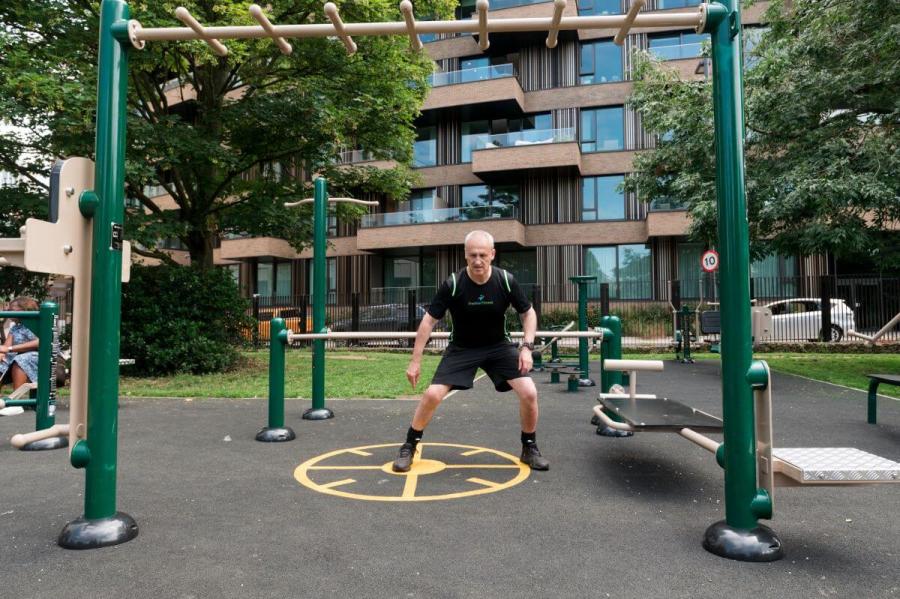 A man works out in Hammersmith Park's new outdoor gym