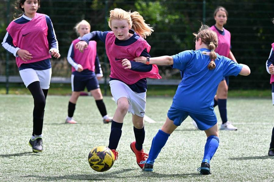 The girls in action on the pitch