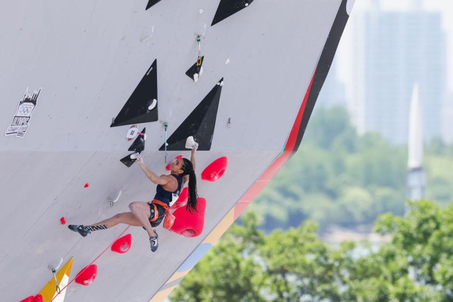  Speed-climber Molly Thompson-Smith scaling a wall