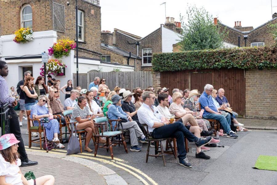 Audience watching the street performance