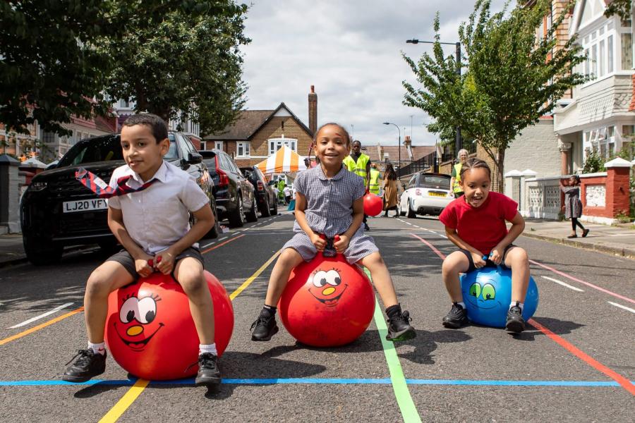 Space hopper race at Melcombe primary school's Play Street.