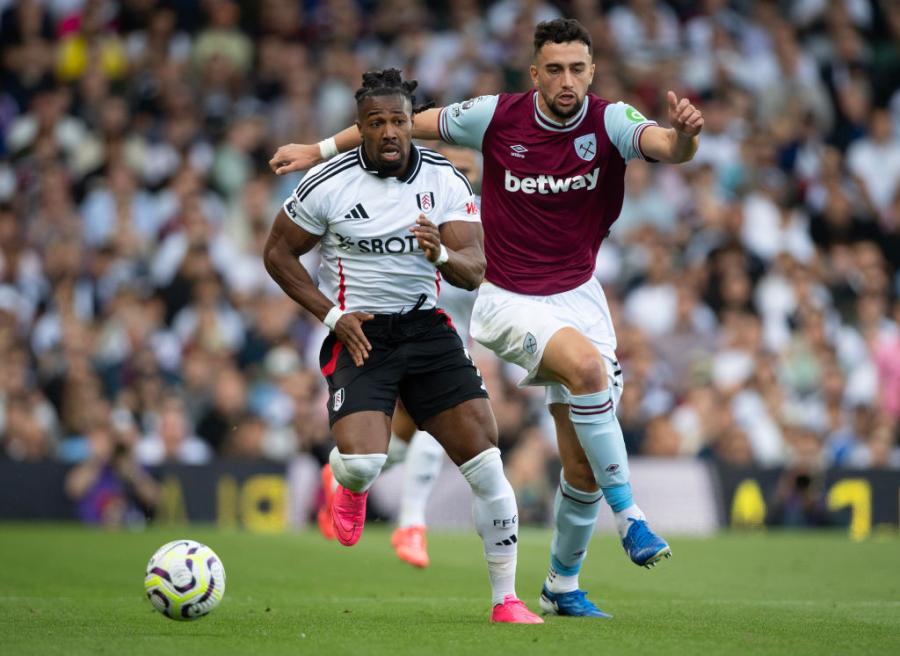 Adama Traore tussles with West Ham's Max Kilman