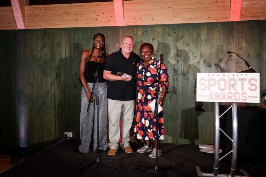 Kevin Smith (centre) with Cllr Holder (right) and Sonia Mkoloma (left)