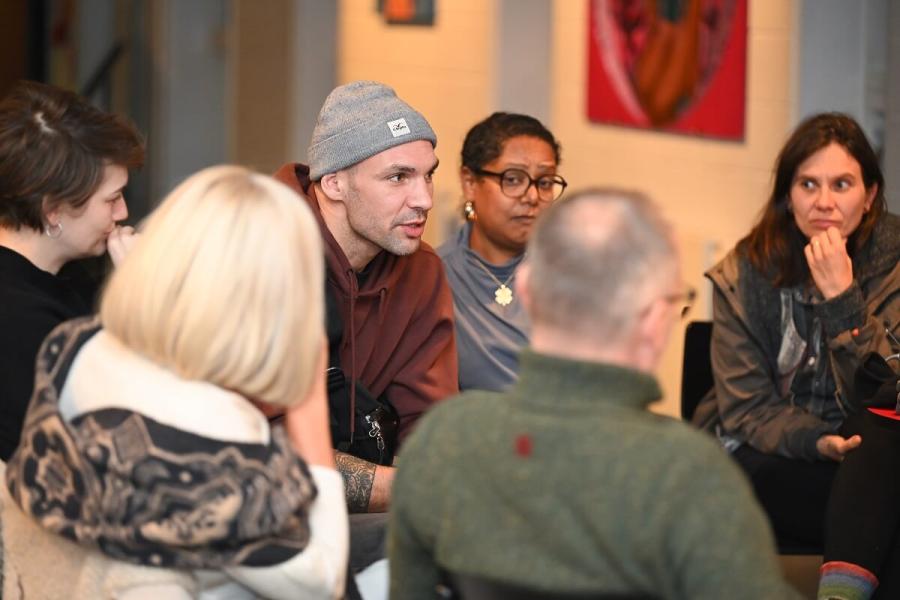 Exchange guests and hosts in conversation at the Lyric theatre in Hammersmith, home to the Young Hammersmith & Fulham Foundation. Pictured centre: Karl Ulke