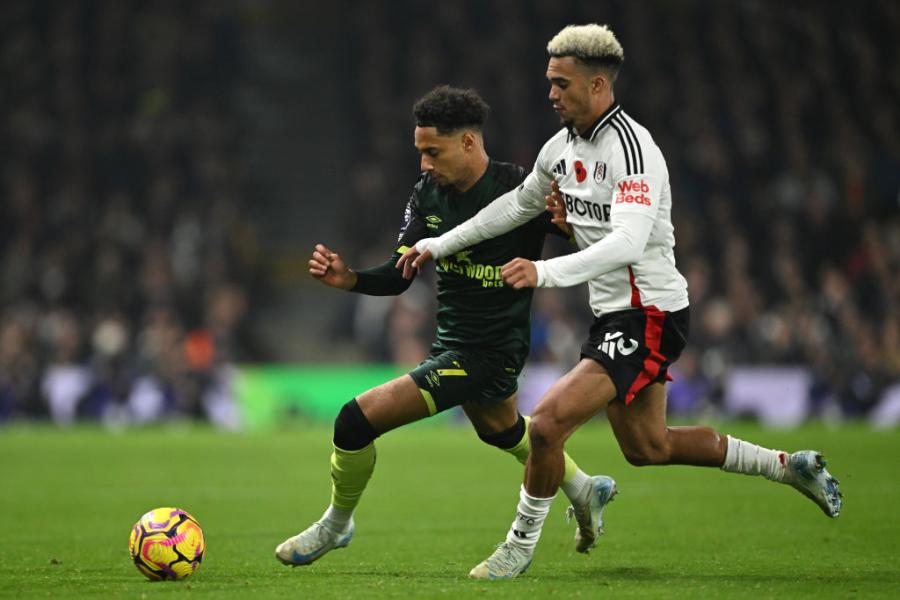 Kevin Schade tussles with Antonee Robinson