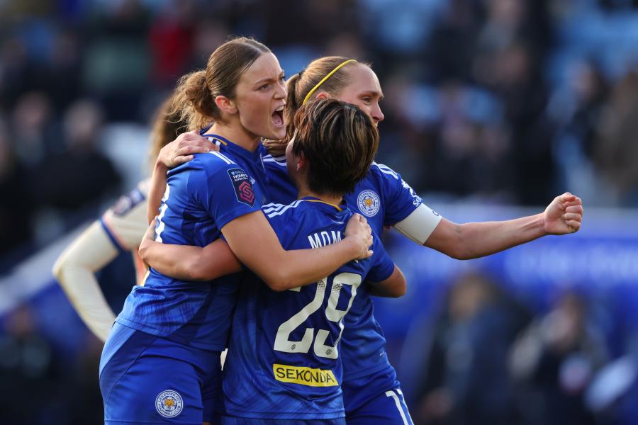 Ruby Mace, Janice Cayman and Yuka Momiki celebrate