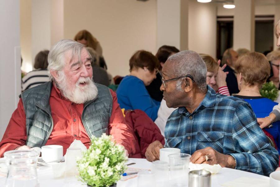 Two men at an H&F Silver Social event