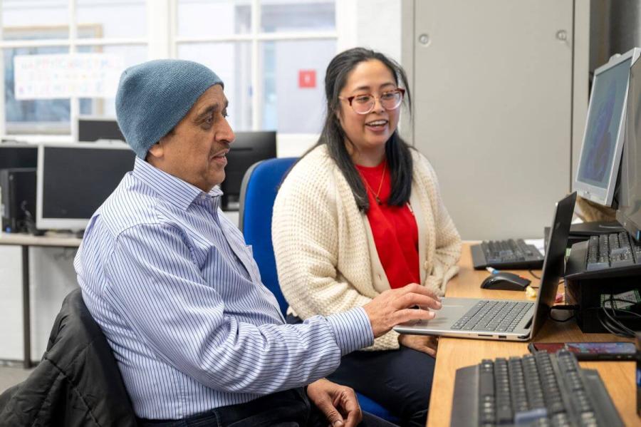 Visitors to H&F's Macbeth Centre sit in front of computers