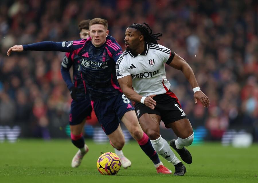  Adama Traore breezes past Elliot Anderson