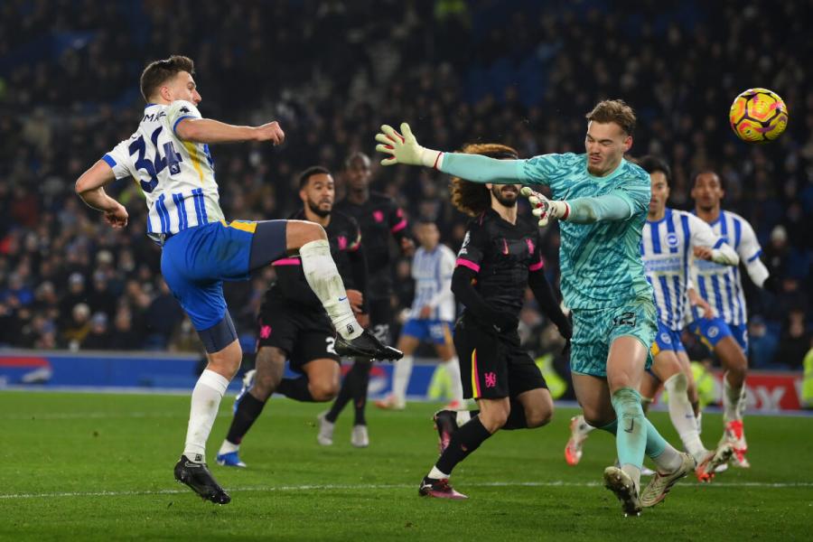 Joel Veltman of Brighton beats Filip Jorgensen of Chelsea, but hits the post 