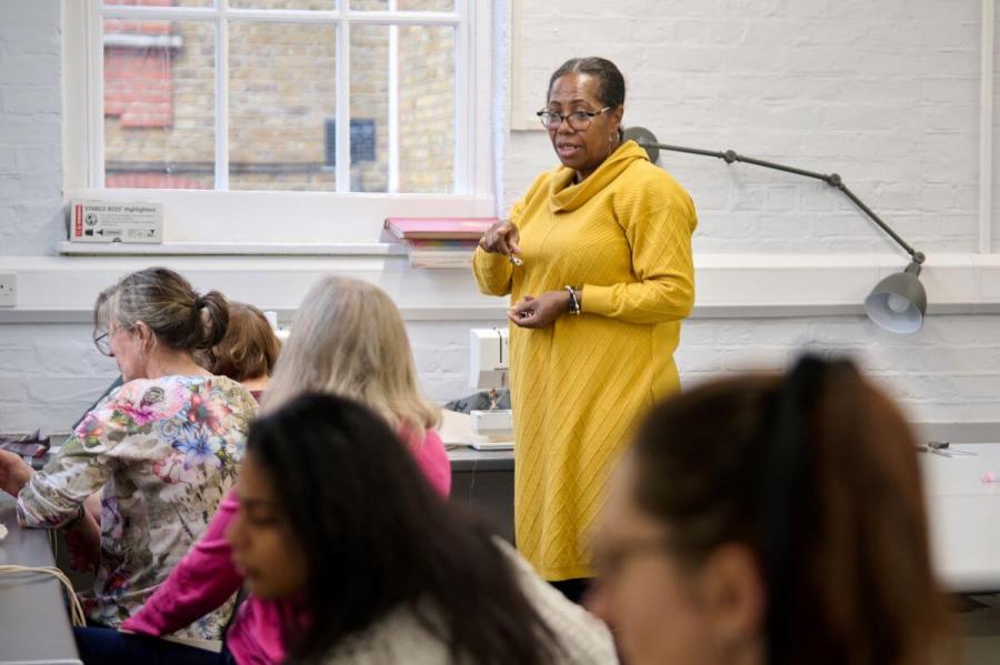 Tutor in a classroom at the Macbeth Centre