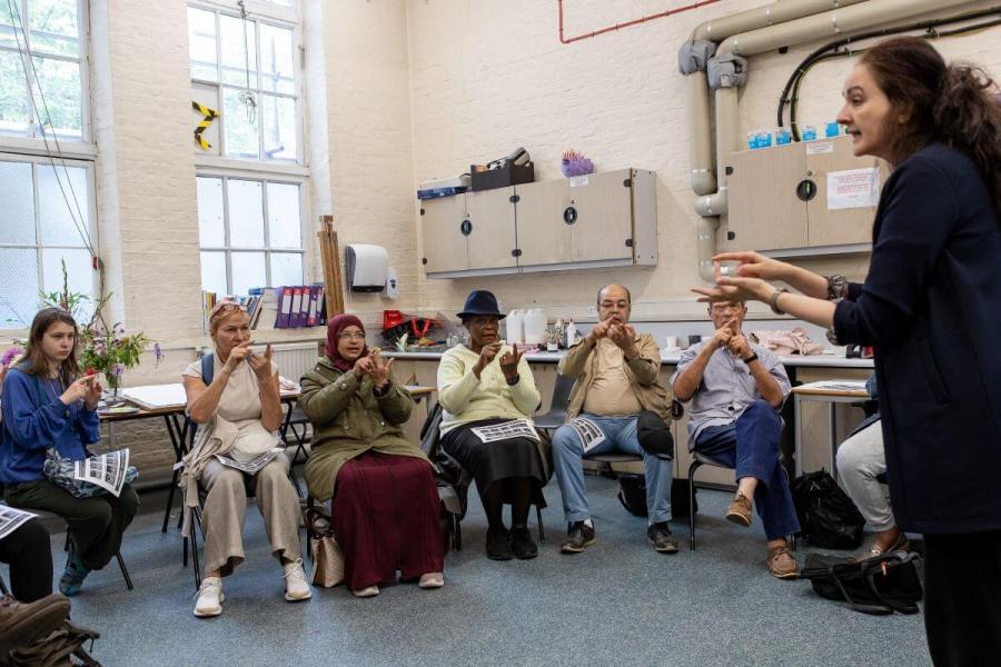 Maria Mavrommatis (right) teaching a BSL class